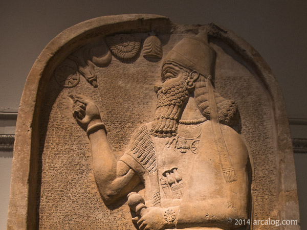 The king under the symbols of his gods, Assur, Shamash, Sin, Adad and Ishtar